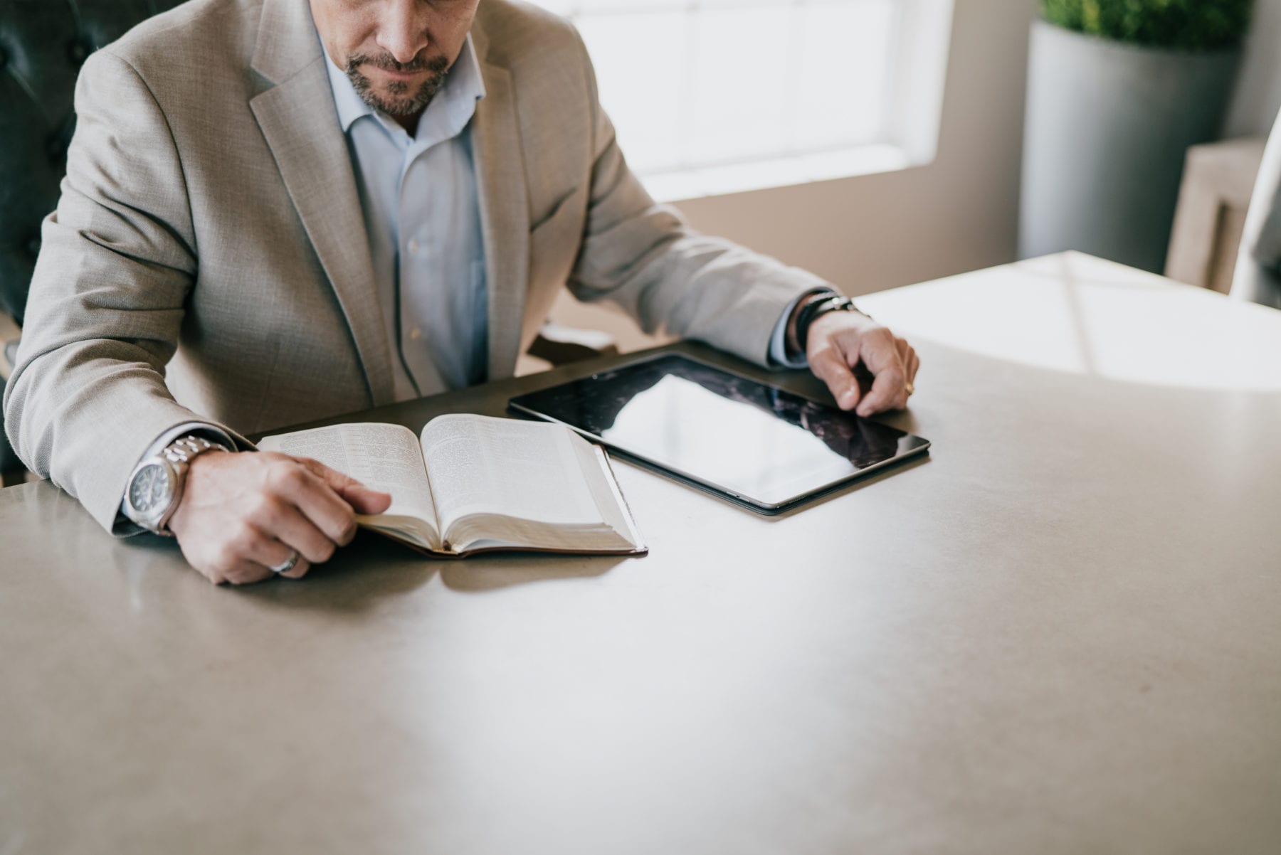 A Pastor studies the Bible.