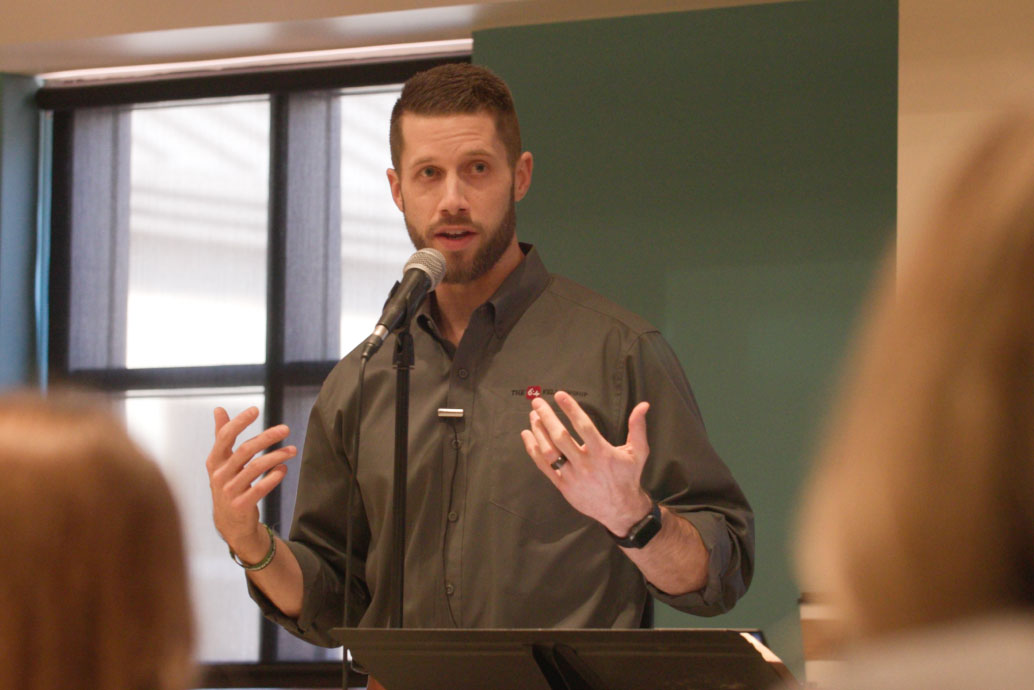 Justin Jeppesen speaks to an audience.